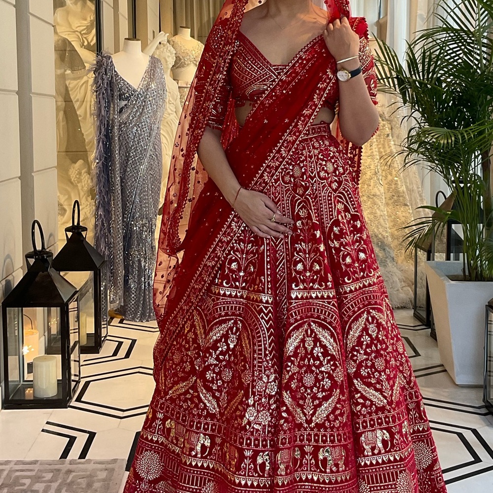 Falguni Shane peacock red lehenga